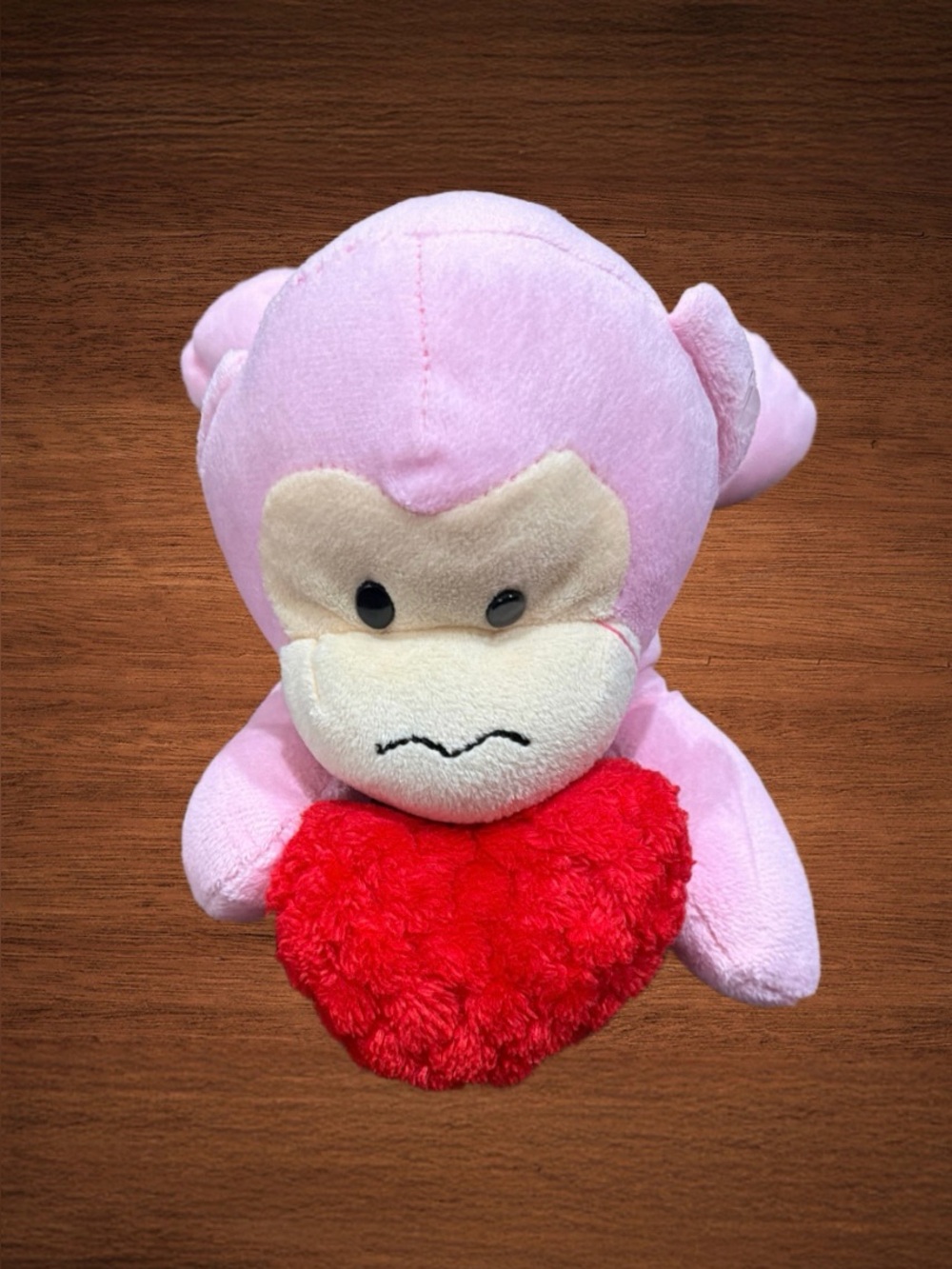 ANIMAL ADVENTURE PINK MONKEY. RED HEART PLUSH.9” long stuffed animal.